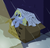 Size: 1577x1507 | Tagged: safe, artist:multiversecafe, derpy hooves, pegasus, pony, g4, abuse, cardboard box, derpybuse, derpygate, female, homeless, mare, newspaper, pony in a box, rain, sad, save derpy, solo