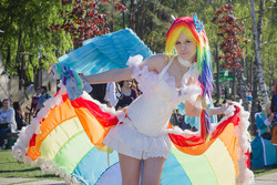 Size: 1024x683 | Tagged: safe, artist:fox-tsai-sheng, rainbow dash, human, g4, clothes, cosplay, dress, female, gala dress, irl, irl human, outdoors, photo, plushie, rainbow dash's gala dress, solo focus