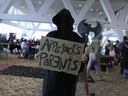 Size: 1024x768 | Tagged: safe, applejack, human, bronycon, g4, applejack's parents, cardboard, clothes, cosplay, costume, crossing the line twice, dark comedy, grim reaper, implied death, irl, irl human, photo