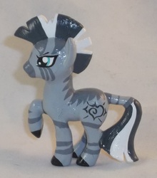 Size: 1705x1937 | Tagged: safe, artist:gryphyn-bloodheart, oc, oc only, oc:xenith, zebra, fallout equestria, blind bag, customized toy, fanfic, female, irl, mare, photo, raised hoof, solo, toy, zebra oc