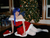 Size: 2144x1638 | Tagged: safe, artist:amaranthialunaris, princess luna, human, g4, christmas, christmas tree, clothes, cosplay, irl, irl human, missing shoes, pantyhose, photo, santa costume, tree