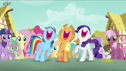 Size: 850x478 | Tagged: safe, screencap, applejack, cheerilee, diamond tiara, fluttershy, peach fuzz, pinkie pie, pipsqueak, rainbow dash, rarity, silver spoon, snails, snips, spike, twilight sparkle, alicorn, earth pony, pony, crusaders of the lost mark, g4, colt, female, male, mane seven, mane six, mare, nose in the air, open mouth, ponyville, raised hoof, singing, twilight sparkle (alicorn), volumetric mouth