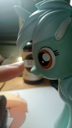 Size: 1073x1907 | Tagged: safe, lyra heartstrings, g4, boop, close-up, finger, imminent boop, nose, photo, vinyl figure