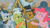 Size: 1366x768 | Tagged: safe, screencap, cloudy quartz, granny smith, igneous rock pie, pinkie pie, g4, hearthbreakers, my little pony: friendship is magic, eyes closed, floppy ears, frown, glare, grin, pie family home, ship:quartzrock, smiling, unamused