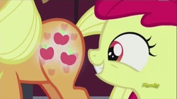 Size: 1040x582 | Tagged: safe, screencap, apple bloom, applejack, earth pony, pony, brotherhooves social, g4, booty call, eyes on the prize, female, filly, glowing cutie mark, looking at butt, out of context