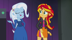 Size: 1280x714 | Tagged: safe, screencap, sunset shimmer, trixie, equestria girls, g4, my little pony equestria girls: rainbow rocks, clothes, cutie mark on clothes, skirt, sunset shimmer's skirt, worried