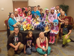 Size: 4608x3456 | Tagged: artist needed, safe, human, trotcon, trotcon 2015, irl, irl human, meetup, photo, physically handicapped sonata, plushie