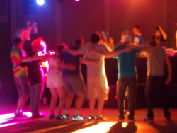 Size: 4608x3456 | Tagged: safe, human, trotcon, trotcon 2015, arm behind back, arms on shoulders, dancing, group shot, irl, irl human, photo, rave