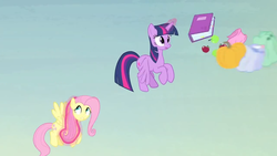 Size: 1366x768 | Tagged: safe, screencap, fluttershy, twilight sparkle, alicorn, pony, g4, the hooffields and mccolts, animation error, apple, book, duo, female, food, magic, mare, pegasus wings, pumpkin, punkin chunkin, twilight sparkle (alicorn)