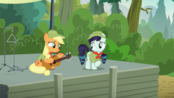 Size: 1280x720 | Tagged: safe, screencap, applejack, coloratura, g4, the mane attraction, camp friendship, cute, filly applejack, guitar, musical instrument, rara, scout uniform, stage, triangle, weapons-grade cute