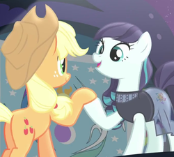 Size: 678x610 | Tagged: safe, screencap, applejack, coloratura, g4, the mane attraction, flag of equestria, hoof hold, rara, stage