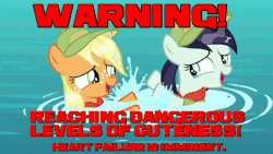 Size: 800x450 | Tagged: safe, edit, screencap, applejack, coloratura, earth pony, pony, g4, the mane attraction, animated, camp friendship, clothes, cute, female, filly, filly applejack, filly coloratura, happy, hat, hnnng, image macro, jackabetes, looking at each other, meme, open mouth, rara, rarabetes, red text, smiling, splashing, warning, weapons-grade cute, younger