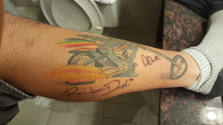 Size: 5312x2988 | Tagged: safe, rainbow dash, human, g4, ashleigh ball, bathroom, irl, irl human, photo, signature, tattoo