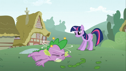 Size: 1366x768 | Tagged: safe, screencap, spike, twilight sparkle, dragon, pony, unicorn, feeling pinkie keen, g4, season 1, baby, baby dragon, circling stars, duo, duo male and female, female, male, mare, ouch, out of context, unicorn twilight, wingless spike