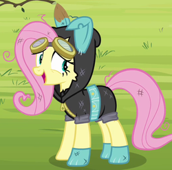 Size: 516x510 | Tagged: safe, screencap, fluttershy, pegasus, pony, g4, magic duel, bunny ears, clothes, costume, cropped, cute, dangerous mission outfit, female, goggles, hoodie, mare, open mouth, outfit catalog, smiling, solo