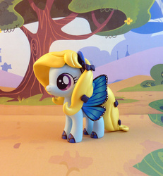 Size: 832x900 | Tagged: safe, artist:krowzivitch, oc, oc only, oc:blue peleide, butterfly pony, original species, pony, bow, butterfly wings, craft, female, figurine, filly, hair bow, sculpture