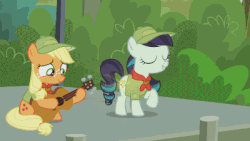 Size: 400x225 | Tagged: safe, screencap, applejack, coloratura, the mane attraction, animated, camp friendship, female, glowing cutie mark, guitar, musical instrument, rara, scout uniform, shining, younger