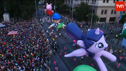 Size: 1280x720 | Tagged: safe, twilight sparkle, human, g4, balloon, chile, helium sparkle, irl, irl human, parade, parade balloon, peppa pig, peppa pig (character), photo, twilight sparkle (alicorn)