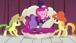 Size: 1280x720 | Tagged: safe, screencap, apple fritter, jonagold, marmalade jalapeno popette, pinkie pie, earth pony, pony, g4, over a barrel, apple family member, background pony, clothes, cowboy hat, dress, eyes closed, female, hat, mare, puffy sleeves, raised hoof, saloon pinkie, seashell, shell, singing, you gotta share, youtube link