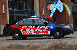 Size: 950x621 | Tagged: safe, rainbow dash, pegasus, pony, g4, anarchist, anarchy, car, ford police interceptor sedan, ford taurus, fuck the police, graffiti, irl, open mouth, photo, police, police car, ponies in real life, road pirate, spray paint, vandalism, youtube link