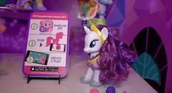 Size: 844x458 | Tagged: safe, pinkie pie, rainbow dash, rarity, pony, g4, doll, fashion style, female, irl, party cannon, photo, toy, toy fair 2015