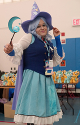 Size: 3766x5887 | Tagged: safe, trixie, human, g4, alicorn amulet, cape, clothes, cosplay, great and powerful, hat, irl, irl human, magical girl, photo, ponycon 2015, ponycon nyc, prop, skirt, trixie's cape, trixie's hat, vest, waistcoat