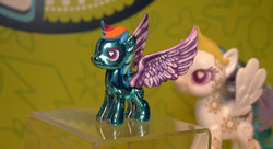 Size: 844x458 | Tagged: safe, princess celestia, rainbow dash, g4, female, irl, metal, photo, spread wings, toy, wingding eyes, wings