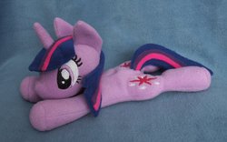 Size: 1024x641 | Tagged: safe, artist:adamar44, twilight sparkle, g4, beanie (plushie), both cutie marks, irl, photo, plushie, prone, solo