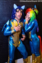 Size: 3456x5183 | Tagged: dead source, safe, artist:cosplayhazard, artist:supersandcosplay, rainbow dash, soarin', human, g4, clothes, cosplay, duo, fake ears, fake wings, female, goggles, irl, irl human, male, photo, uniform, whispering, wonderbolts, wonderbolts uniform