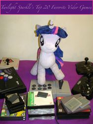 Size: 1749x2332 | Tagged: artist needed, safe, twilight sparkle, g4, arcade stick, atari 2600, game boy advance, game boy color, gamecube, horn, horn ring, irl, jin, logic 3, logic3, nintendo entertainment system, photo, playstation, plushie, sega genesis