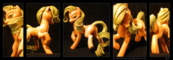 Size: 2600x900 | Tagged: safe, artist:kp-shadowsquirrel, rarity, pony, unicorn, g4, butt, carving, craft, female, irl, orange, photo, plot, raised hoof, rearity, sculpture, solo