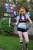 Size: 3264x4928 | Tagged: safe, artist:artsbyjamie, rainbow dash, human, g4, belly button, clothes, cosplay, irl, irl human, midriff, photo, shorts, socks, sports boots, sports bra, sports shorts, tank top