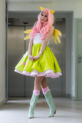 Size: 1024x1534 | Tagged: dead source, safe, artist:chatelier, fluttershy, human, equestria girls, g4, clothes, cosplay, irl, irl human, photo, pony ears, solo, wings