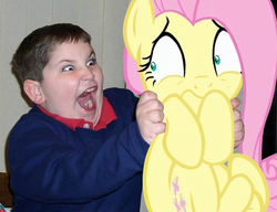 Size: 600x460 | Tagged: safe, artist:dtkraus, fluttershy, human, pony, g4, child, creepy, holding a pony, irl, irl human, photo, ponies in real life, red eye, scared, target demographic, terror, wat
