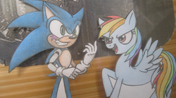 Size: 1024x575 | Tagged: safe, artist:spectrum-sparkle, rainbow dash, g4, amputee, bashing, crossover, irl, male, papercraft, photo, prosthetic arm, prosthetic limb, prosthetics, sonic the hedgehog, sonic the hedgehog (series), traditional art