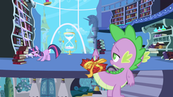 Size: 1280x720 | Tagged: safe, screencap, spike, twilight sparkle, dragon, pony, unicorn, friendship is magic, g4, book, bookshelf, canterlot, duo, female, hourglass, male, mare, twilight's canterlot home, unicorn twilight