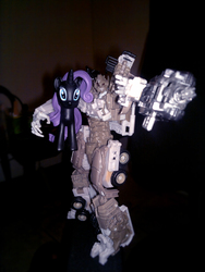 Size: 3000x4000 | Tagged: safe, artist:ultron98, rarity, g4, brony, dark of the moon, funko, irl, megatron, mystery minis, photo, photography, toy, transformers