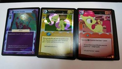 Size: 960x540 | Tagged: safe, enterplay, apple bloom, applejack, discord, fluttershy, lord tirek, absolute discord, g4, my little pony collectible card game, appletini, card, ccg, flutterguy