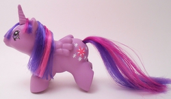 Size: 600x348 | Tagged: safe, twilight sparkle, alicorn, pony, g1, g4, customized toy, female, filly, g4 to g1, generation leap, irl, mare, photo, toy, twilight sparkle (alicorn)