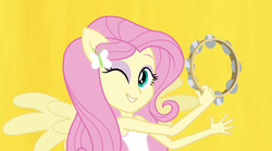 Size: 1280x714 | Tagged: safe, screencap, fluttershy, equestria girls, g4, my little pony equestria girls: rainbow rocks, female, musical instrument, ponied up, solo, tambourine