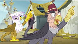 Size: 1920x1080 | Tagged: safe, screencap, gilda, grampa gruff, griffon, g4, the lost treasure of griffonstone, blind eye, discovery family logo, eye scar, fez, frown, hat, imitation, looking at you, mocking, open mouth, pointing, raised claw, scar, smiling, unamused