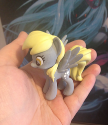 Size: 960x1104 | Tagged: safe, artist:matteglaze, derpy hooves, pony, g4, customized toy, holding a pony, irl, photo, pony in hand, repaint