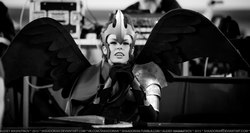 Size: 1600x851 | Tagged: safe, artist:dixidana, artist:shaadorian, nightmare moon, human, g4, 2015, armor, black and white, clothes, cosplay, grayscale, helmet, irl, irl human, photo, rubronycon, russian, solo, wings