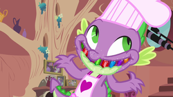 Size: 1280x720 | Tagged: safe, screencap, peewee, spike, g4, just for sidekicks, chef's hat, hat, jewel teeth, jewels, male, smiling, solo, teeth, toque
