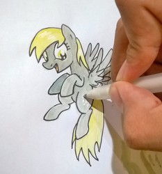 Size: 1728x1854 | Tagged: safe, artist:digiral, derpy hooves, pegasus, pony, g4, drawn into existence, female, floating, fourth wall, hand, mare, solo, traditional art