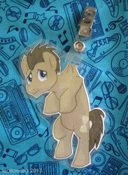 Size: 570x777 | Tagged: safe, artist:lobitaworks, doctor whooves, time turner, pony, g4, badge, con badge, hanging, irl, male, merchandise, photo, stallion, unamused
