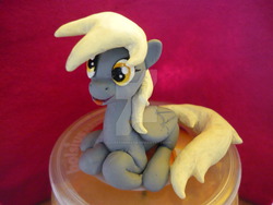 Size: 2828x2121 | Tagged: safe, artist:oliverthepanda, derpy hooves, pegasus, pony, g4, craft, customized toy, figurine, handmade, high res, irl, lying, photo, sculpture, solo