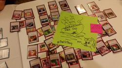 Size: 599x337 | Tagged: safe, artist:postitpony, everfree northwest, card game, shipfic, sticky note, traditional art, trash ship