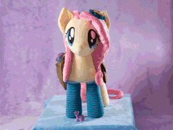 Size: 640x480 | Tagged: safe, artist:pheiplushies, fluttershy, twilight sparkle, g4, animated, blind bag, clothes, flutterbutt, funko pop!, irl, perfect loop, photo, plushie, saddle bag, socks, spinning, toy