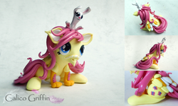 Size: 800x480 | Tagged: safe, artist:calicogriffin, fluttershy, classical hippogriff, griffon, hippogriff, rabbit, g4, classical hippogriffied, hippogriffied, hipposhy, irl, photo, sculpture, species swap